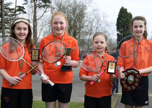 Harmony Hill Primary School Badminton teams recently completed an amazing March double double. The Lambeg school won the Girls Ulster League and Ulster Cup double followed immediately by the Boys Ulster League and Cup Double. Pictured in the Girls team are Rachel Mooney, Katie Allen, Chloe Woods and Lucy Mathers. US1511-553cd  Picture: Cliff Donaldson