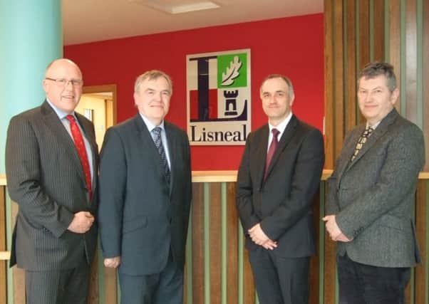 Pictured are, from left: Peter Eakin, Vice Chairman Board of Governors, David Funston, Principal, Michael Allen, new Principal and Dr Colin Hamilton, Chairman Board of Governors.