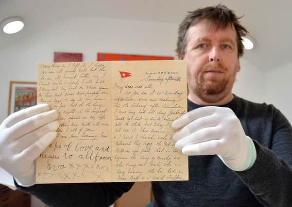 Lurgan conservator, Sean Madden with the letter from the Titanic he has been restoring. INLM17-212.
