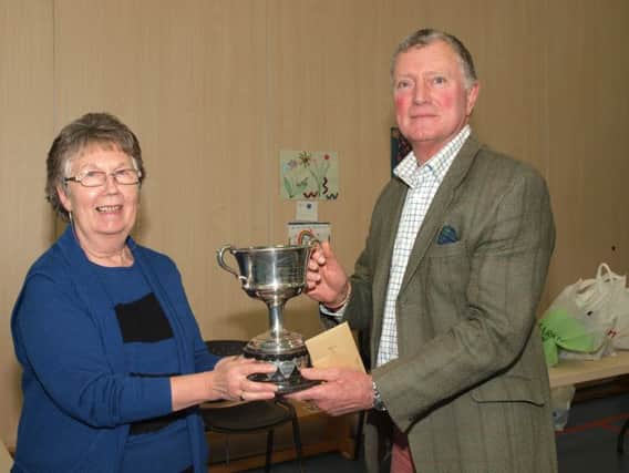 Hillsborough Horticulture Society President Jacqui Townsley with the Spring Show's special prize-winner, Mr Niall Watson, Killinchy.