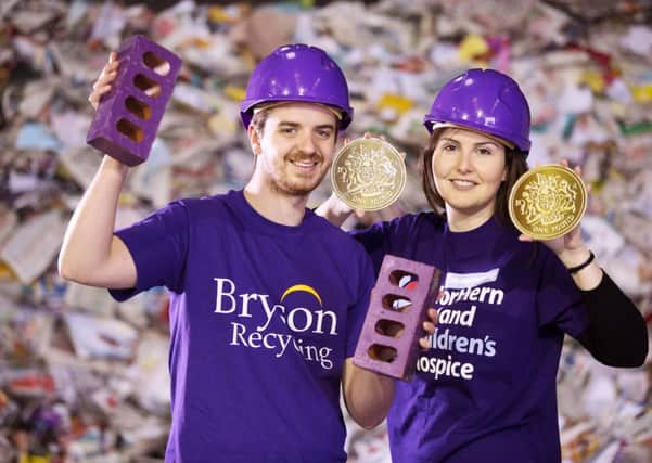 Declan Reynolds from Bryson Recycling and Eva Toil from the NI Hospice mark the success of the recent £1 a tonne campaign which will see Bryson donate over 215bricks to the Hospice rebuild at Somerton Road in Belfast.