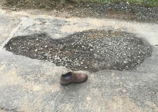 This pot hole in Ardboe has been branded 'a disaster waiting to happen'