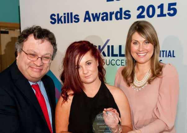 Minister for Employment and Learning, Dr Stephen Farry, Co Derry Winner Demi Kyle and Compere Sarah Travers.