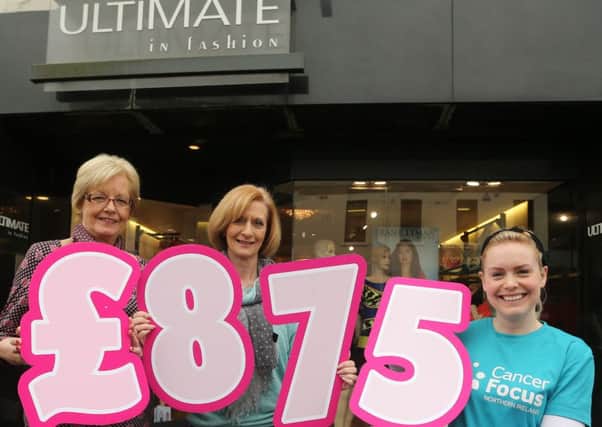 Proprietor of Ultimate in Fasthion Libeth McAllister (centre), who raised £875 for Cancer Focus Northern Ireland during an Open Night at her Wellington Street store is seen here presenting the money to Vivian Pundyke (left) of the Ballymena Cancer Focus Group and Cancer Focus Community Fundraiser Suzi McIlwain. INBT 17-100JC