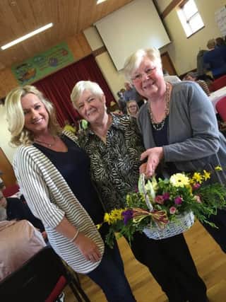 Attending the coffee morning and flower arranging demonstration were Jo-Anne Dobson MLA, Irene Dickson and Patsy Cush.