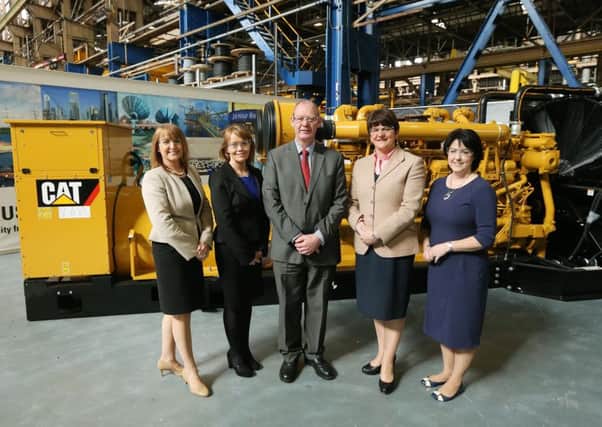 Ann McGregor (NI Chamber of Commerce), Caitriona Toner (American Airlines), Robert Kennedy (Caterpillar NI), Minister Arlene Foster and Brenda Morgan (British Airways) at the Minister on the Move event in Larne.  INLT 16-675-CON