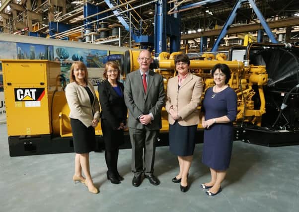 Ann McGregor (NI Chamber of Commerce), Caitriona Toner (American Airlines), Robert Kennedy (Caterpillar NI), Minister Arlene Foster and Brenda Morgan (British Airways) at the Minister on the Move event in Larne.  INLT 16-675-CON