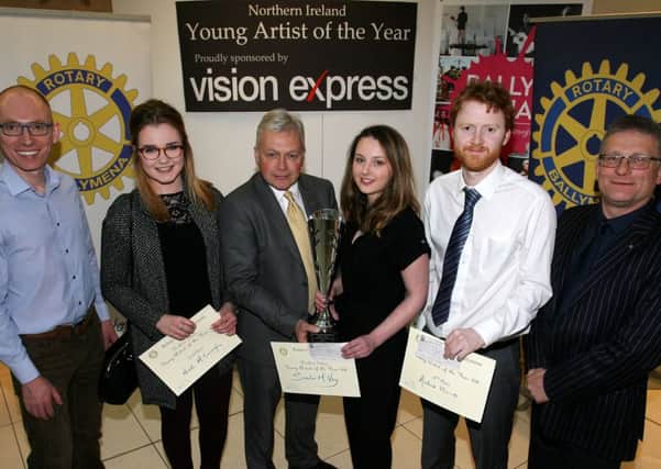 Leslie Crawford, President of Ballymena Rotary Club, present the first place award for the NI Young Artist of the Year to Sasha McVey, during the recent presentation evening in The Braid. Included are Andrew Haire (4th), Naimh McConaghy (2nd), Roy McKeown (Chairman NI Young Artist of the Year) and John Brodrick (Vision Express). Absent from the photo is Jessica McFee who finished third. INBT17-203AC