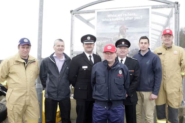 Pictured on Rathlin Island to launch new wildland fire prevention signage for the coming season, are Firefighter Fergus McFaul; Michael Cecil, Chairman of the Rathlin Development & Community Association, who is also a firefighter; Area Commander Gary Thompson; Rathlin Watch Commander, Noel McCurdy; Assistant Group Commander Noel Darley; John Morton, Causeway Coast & Glens Borough Council and Crew Commander Kevin Blaney . INBM17-15S