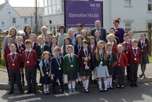 Local Primary School pupils who took part in Bannview Care Homes First Poetry Competition, the topic being "When I Grow Old", are pictured with their Teachers and Parents © Edward Byrne Photography INBL1516-209EB