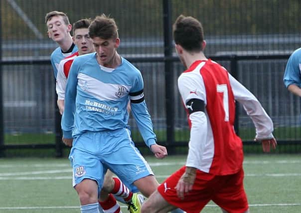Ballymena United youth team captain Jake McNeill in action against Cliftonville. INBT47-251AC