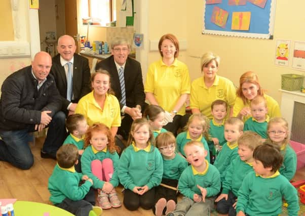 Education Minister John O'Dowd meeting with staff and children.