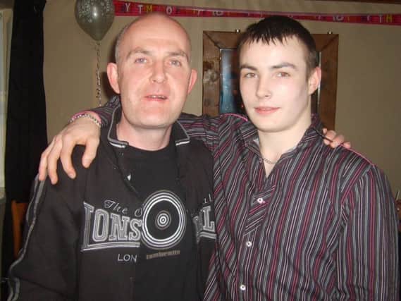 Kyle Simmons with his dad David.