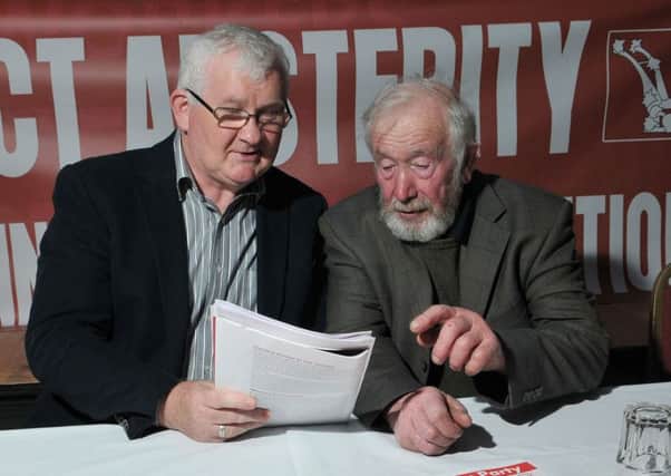 Workers Party Mid-Ulster Election Candidate Hugh Scullion chats with Francie Donnelly during Monday night's campaign launch.INMM1515-347