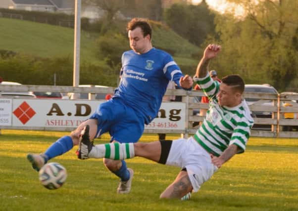 Action from the game between Dollingstown and Lurgan Celtic