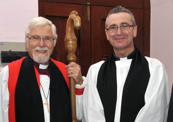 The Right Reverend Harold Miller, Bishop of Down and Dromore with Rev Alan Kilpatrick at his installation as rector of Knocknamuckley Parish Church. Included are Davis Parks, rectors church warden and Walter Cordner, peoples church warden. INLM46-107gc