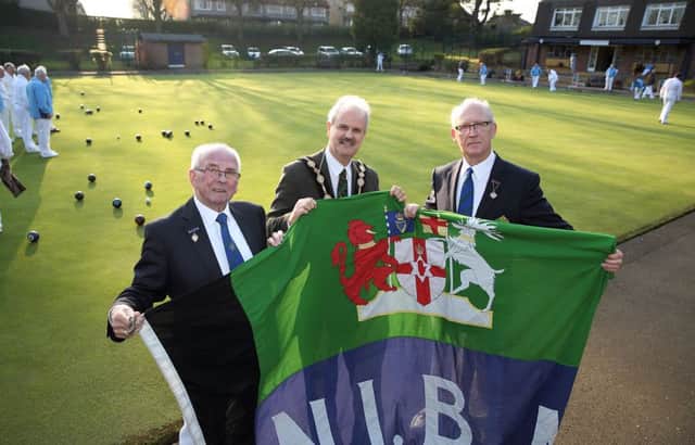 Lisburn Mayor Thomas Beckett with William Barron, outgoing president of the NI Bowling Association, and Ken Armstrong, from Lisnagarvey Bowling Club, the new president of the NIBA. Mr Armstrong is the first member of Lisnagarvey to be appointed NIBA president in the club's 59 year history. US1516-503cd  Picture: Cliff Donaldson