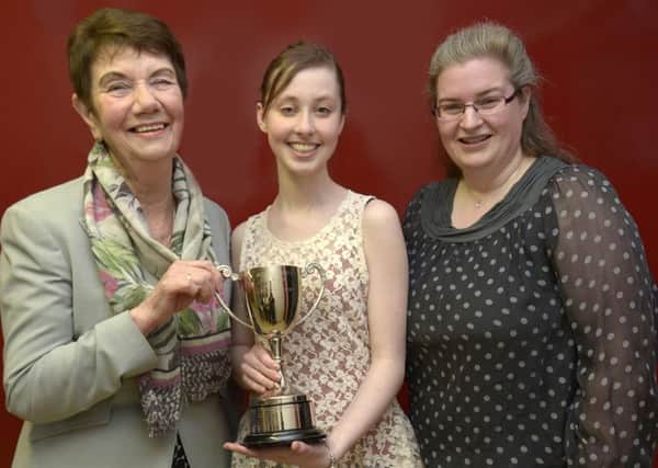 LCM Examiner Sheila Hemming LLCM ARCM HonLCM presented the Sonya Russell Cup for Musical Achievement to Alex Lyle, included is LCM Local Representative Sonya Russell ALCM,HonLCM © Edward Byrne Photography INBL1516-212EB