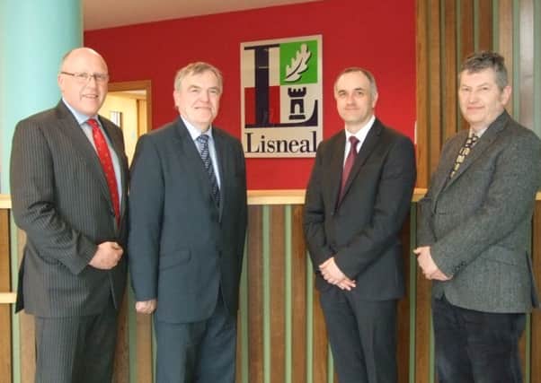 Picture are, from left: Peter Eakin, Vice Chairman Board of Governors, David Funston, Principal, Michael Allen, new Principal and Dr Colin Hamilton, Chairman Board of Governors.