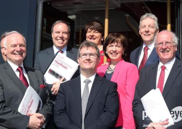 Sitting Lagan Valley MP Jeffrey Donaldson (centre) with DUP party leader Peter Robinson and senior party colleagues.