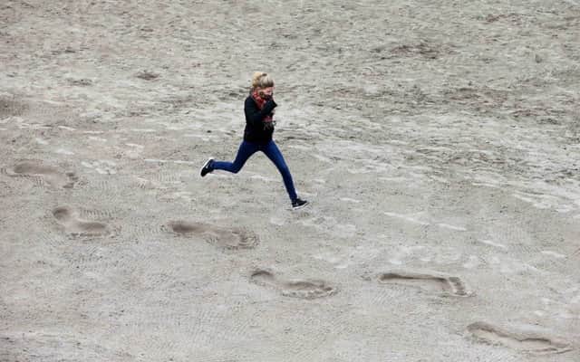 True-to-scale giants footprints appeared on Portstewart Strand, created by a team of award-winning sand sculptors from the Netherlands as part of a new Tourism Ireland media campaign.