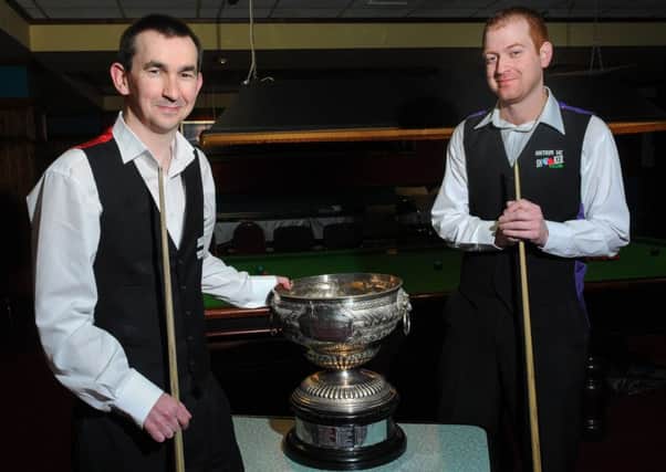 Dungannon's Patrick Wallace kept his grip on the Northern Ireland Championship trophy with a 10-2 win over challenger Jordan Brown from Antrim