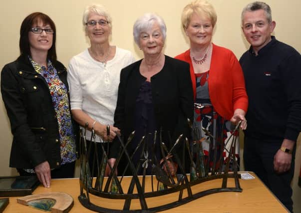 Gerard Loughran, of Ballinliss Forge, pictured at the display of work created for the 'Down By The Faughanside' Project for Drumahoe Community Association with Lorraine Hetherington, Pamela Dunn, Betty Cross and Jean Brown. INLS1715-172KM