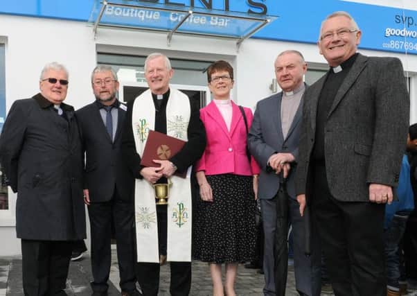 Denis Loughry, president of Cookstown St. Vincent de Paul pictured with clergy who attended the official opening of the new look St. Vincent de Paul shop in Cookstown - Canon Porteus,  Fr Tremer, Rev. June Bradley, Rev. Isaac Thompson and Fr. Paddy Hughes. INMM16-550.