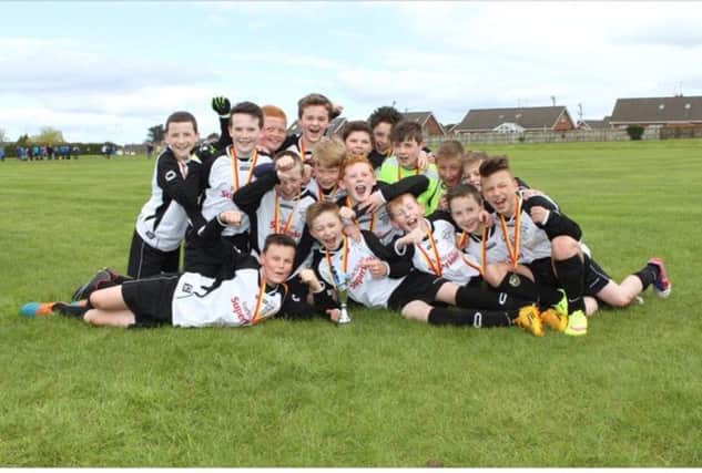 Rathfriland Youth U13s won their Cup with a penalty victory over Moira.