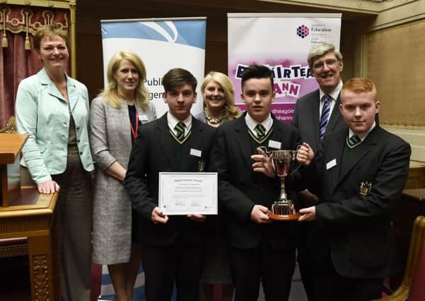 Education Minister, John O'Dowd and Mary Black (PHA) at the launch of the Derrytrasna Awards.  The awards were established in recognition of outstanding pastoral care provided by schools.  Also pictured are pupils from St Paul's Junior High and Principal Dr Fionnuala McCann. Left to right - Mary Black (PHA), Fionnuala Moore, Ben McConville, Dr Fionnuala McCann, Tiernan Mulholland, Minister O'Dowd, Marc Comiskey