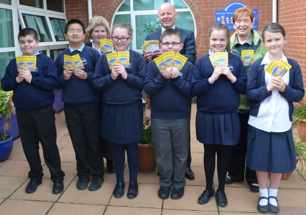 Alderman May Beattie,  Mr Austin, principal of St Nicohlas' Primary School, Mrs Corey and members of the school's Eco Committee, Ellie Morgan, Connor OHara, Nico Diola, Luke Haighton, Roisin Austin and Sophie Cashe. INCT 17-759-CON