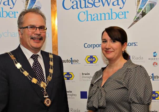 Causeway Chamber of Commerce President Ian Donaghey with Chamber sponsor Clare McIntyre of  B&E Security at the Good to Great presentation by David Meade at the Bushtown Hotel   05  Clancy Photography with David Meade