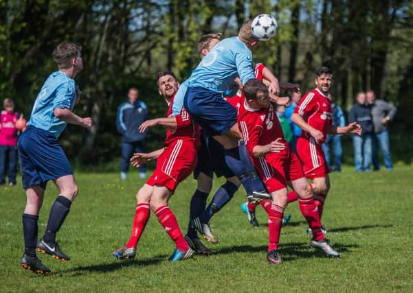 Action from the recent cup tie between Ballyoran and Hill Street. Pic by Phil Ray.