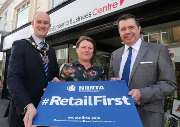 Chief Executive of the Northern Ireland Retail Trade Association Glyn Roberts (right) with Melanie Christie Boyle of Ballymena Business Centre and Ballymena Borough Chamber of Commerce & Industry president Alan Stewart at last week's launch of Retail First. INBT 19-105JC