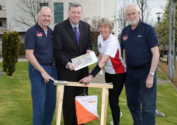 At the launch of the Lisburn City Festival of Orienteering due to take place from the 1st to 4th May are: (l-r) Colin Henderson, Lagan Valley Orienteers; Alderman Paul Porter, Chairman of the Council's Leisure & Community Development Committee; Heather, a competitive orienteer and Harold White, Lagan Valley Orienteers.