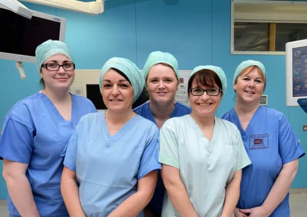 Some of the staff team in one of the new theatres at Craigavon Area Hospital.