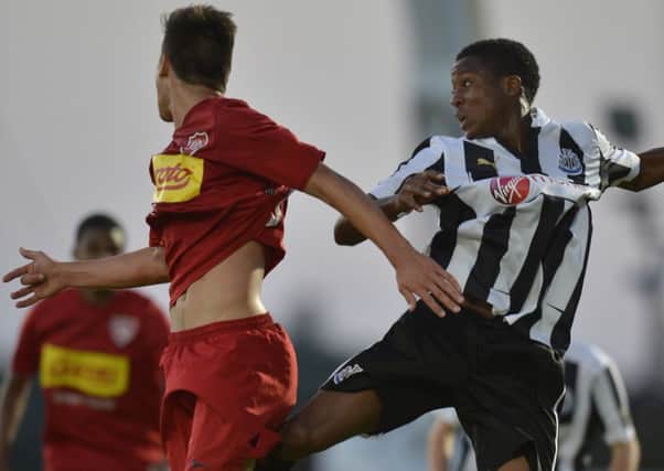 Newcastle United's Rolando Aarons (right) pictured in the 2012 Milk Cup Premier Final against Desportivo Brasil. Picture by Russell Pritchard/Presseye