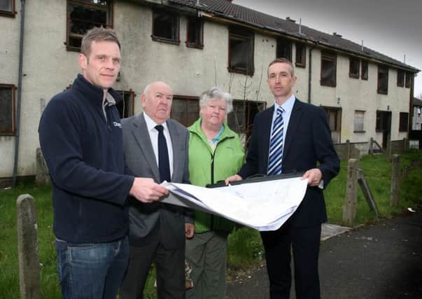 Pictured looking at plans in Ballysally are from left; Chris Campbell, Dixon Contractors, Lexie Hynds, Building Ballysally Together chairman, Ann Smyth, Building Ballysally Together vice-chairman, and Matthew McLaughlin, project manager. INCR18-332PL