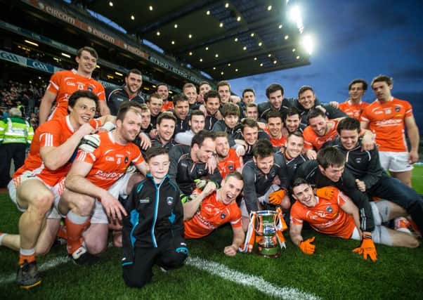 Armagh players celebrate with the cup after the game
.