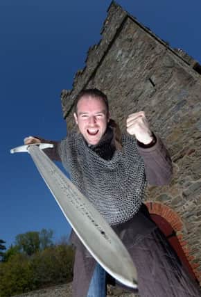 PACEMAKER, BELFAST, 23/4/2015: North West 200 hero Alastair Seeley has some fun during a visit to the Winterfell Game of Thrones at Castle Ward, Co Down.
Part of the blockbuster series was filmed at Castle Ward and Seeley's visit was filmed by BBC NI who will broadcast his races at the Vauxhall International North West 200 during their coverage in 2015.
PICTURE BY STEPHEN DAVISON