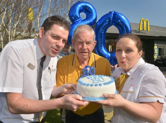 Neil McRoberts and Charlene Orme with Bob Beattie on his 80th birthday at McDonald's, Carrick.  Photo by Aaron McCracken/Harrisons. INCT 18-702-CON