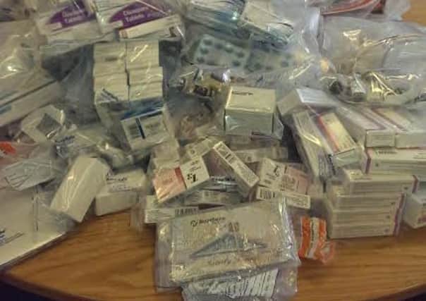 24-year-old man arrested in connection with police seizure of money and drugs
