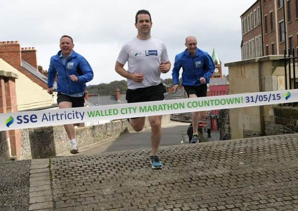 READY! STEADY! GO!!. . . . . Ciaran Bradley, Walled City Marathon organising team, Donal Gormley, SSE Airtricity, and leading local runner Greg Roberts get in some last minute training for the SSE Airtricity Walled City Marathon.