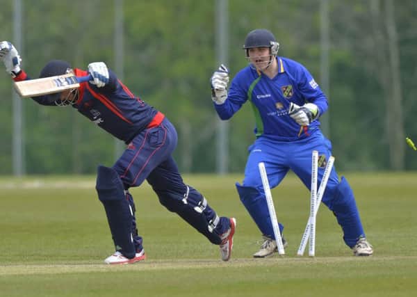 Rassie Van Der Dussen of Northern Knights is bowled much to the delight of North West Warriors wicketkeeper Ricky Lee Dougherty. Picture by Rowland White/Presseye