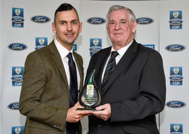 FAI President Tony Fitzgerald presents the Hall of Fame trophy to former Derry City striker Mark Farren. Picture by Matt Browne (Sportsfile).