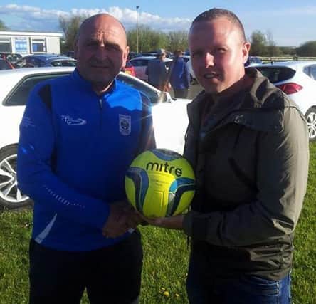 The O'Hara Cup final matchball sponsor Jason Camlin of JC Contracts with Garry Anderson-Reserve Team Assistant Manager. Garry's Moneyslane Reserves side lost the game 4-1 to Ambassadors Reserves.