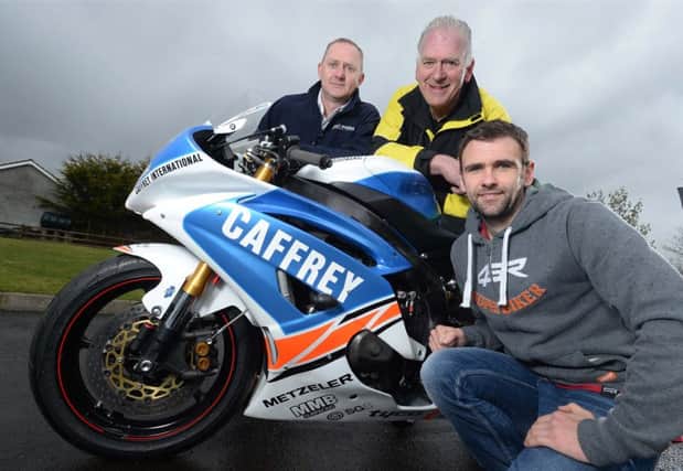Long established graphic design and printing services company, First4Printing, is sponsoring the Supersport Race, which will take place on Friday 24th July 2015 in Armoy. Pictured here are Chris Atchison, Director of First4Printing with Bill Kennedy, Clerk of the Course, AMRRC, and William Dunlop who will be, this year, riding the Chris Dowd/Ivan Curran Racing Caffrey Yamaha YZF- R6. @Stephen Davison