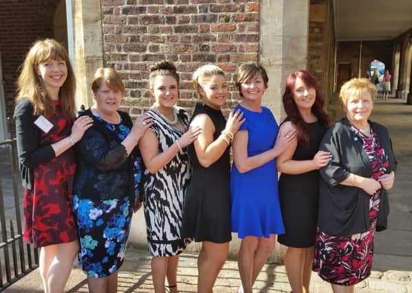 Ciara, Irene, Lauren, Danielle, Louise, Shalana and Trish from The Prom Friendship Group visit St James' Palace. INLT-18-714-con