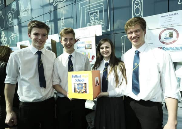 From left: Thomas Moore, Andrew Walker, Rachel Leer and Josh Edwards, from Belfast High School, pictured with their Sentinus Team R&D project, Energy Reduction which has been developed in partnership with Coca Cola Hellenic. INNT 19-450-CON