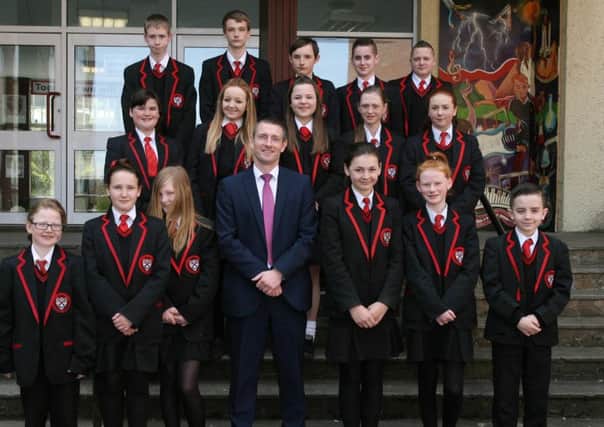 Coleraine College New Principal is pictured with pupils when he started last Friday. INCR19-332PL